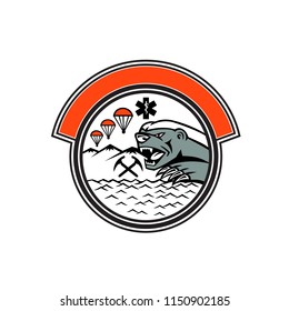 Badge mascot illustration of head of a honey badger with paramedic symbol, air parachute, crossed ice axe, mountain and sea, set inside circle on isolated background in retro style.