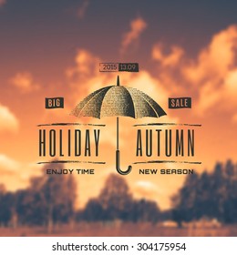 Badge umbrella, hello autumn, creating a soft background of autumn forest  can be used to design packages of goods during autumn sales