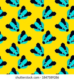 Badger head, seamless pattern on yellow background.