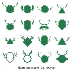 Badges with deer horns on white background. Vector emblem with grunge effect for print on t-shirt. Set of hunting club logo, emblem.