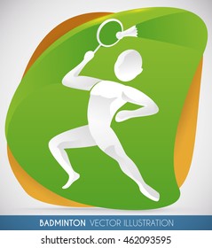 Badminton player doing his best shot hitting the shuttlecock and winning the match.