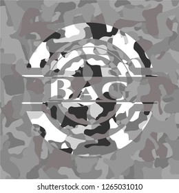 Bag  on grey camouflaged texture