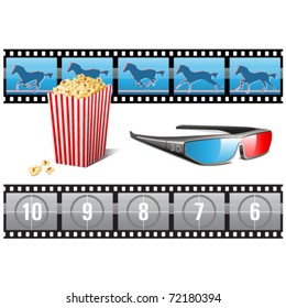 A bag of popcorn, 3D glasses and movie filmstrips.