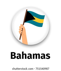 Bahamas flag in hand, round icon with shadow isolated on white. Human hand holding flag, vector illustration