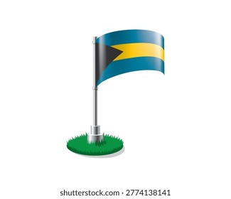 Bahamian flag on a flagpole mounted on the grass