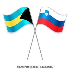 Bahamian and Slovenian crossed flags. Bahamas combined with Slovenia isolated on white. Language learning, international business or travel concept.