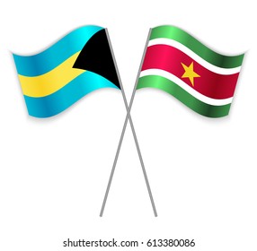 Bahamian and Surinamese crossed flags. Bahamas combined with Suriname isolated on white. Language learning, international business or travel concept.