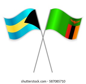 Bahamian and Zambian crossed flags. Bahamas combined with Zambia isolated on white. Language learning, international business or travel concept.