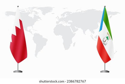 Banderas de Bahréin y Guinea Ecuatorial para una reunión oficial en el fondo del mapa mundial.