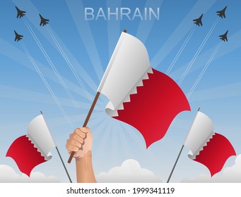 Banderas de Bahréin vuelan bajo el cielo azul