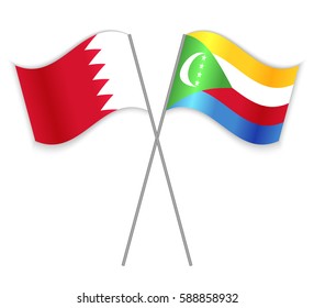 Bahraini and Comoran crossed flags. Bahrain combined with Comoros isolated on white. Language learning, international business or travel concept.