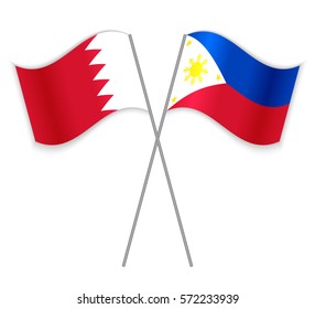 Bahraini and Filipino crossed flags. Bahrain combined with Philippines isolated on white. Language learning, international business or travel concept.