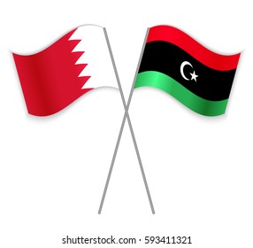 Bahraini and Libyan crossed flags. Bahrain combined with Libya isolated on white. Language learning, international business or travel concept.