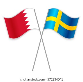 Bahraini and Swedish crossed flags. Bahrain combined with Sweden isolated on white. Language learning, international business or travel concept.