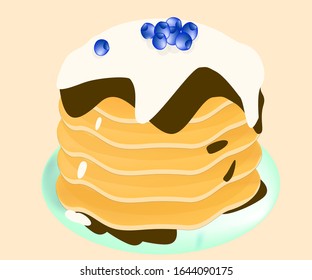 baked pancakes, with chocolate and vanilla syrup, garnished with blueberries