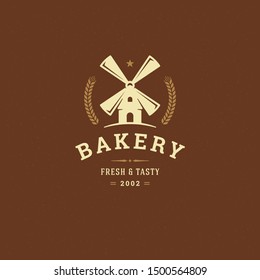 Bakery badge or label retro vector illustration mill silhouette for bakehouse. Vintage typographic logo design.