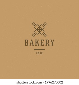 Bakery badge or label retro vector illustration. Rolling pins silhouette for bakehouse. Vintage typographic logo design.