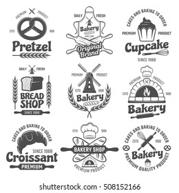 Bakery black white emblems with mill and wheat bread and pastry culinary tools isolated vector illustration