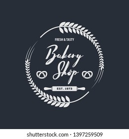 Bakery or bread shop logo, emblem in vintage style. Vector illustration