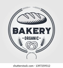 Bakery or bread shop logo, emblem in vintage style. Vector illustration