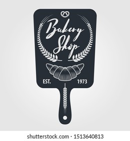 Bakery or bread shop logo, emblem in vintage style with Croissant and Wheat Ears. Vector illustration