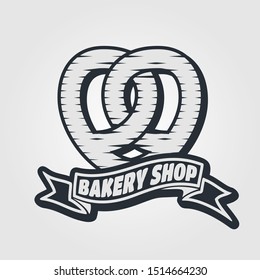 Bakery or bread shop logo, emblem in vintage style with Pretzel. Vector illustration