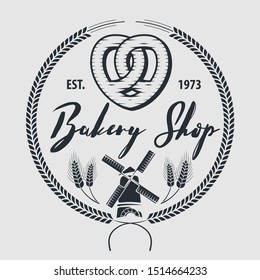 Bakery or bread shop logo, emblem in vintage style with Pretzel. Vector illustration