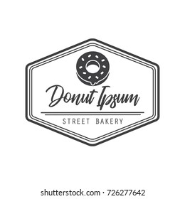 Bakery or cake shop vector logotype, label in vintage style with donut. Rubber stamp.