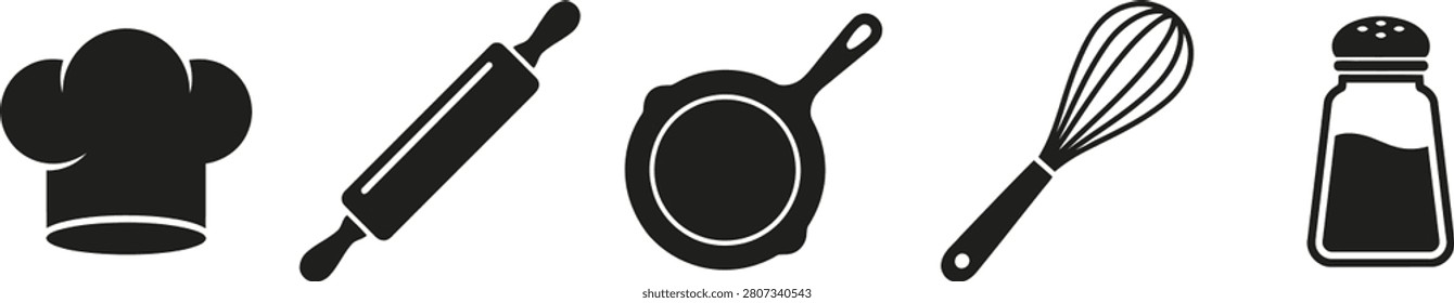 Bakery and cooking tool set featuring white chef hat wooden rolling pin frying pan metal whisk and salt shaker.