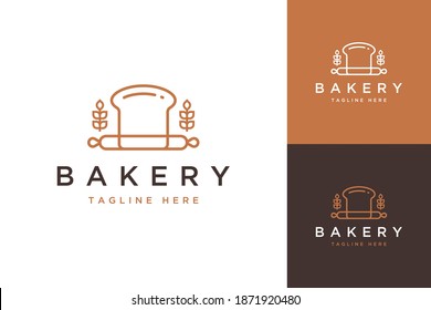 bakery design logo, or bread with grinder and wheat 