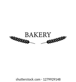 Bakery logo, label, badge, emblem. minimalism style. Ear of wheat. Isolated on background. Vector illustration.