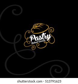 Bakery logo. Pastry logo. Bread and spike on dark background.