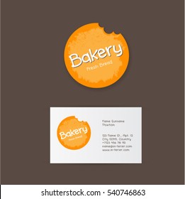 Bakery logo. Yellow bitten circle as bread on a dark background.