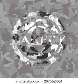 Bakery on grey camo texture 