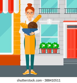Bakery owner with bread.
