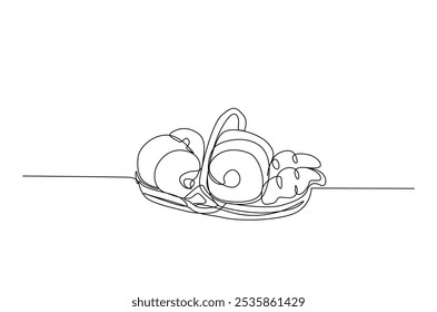 Bakery products in the basket drawing in continuous one line style. Bread, donut, croissant, bakery concept in single line art illustration. Editable vector.  