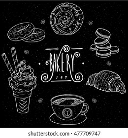 Bakery set in handmade chalk board style contains Donuts, Biscuit roll, Cookies similar to macaron, Croissant, Cup of coffee, Waffle cone with ice cream