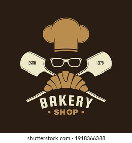 Bakery shop badge, logo. Vector. Typography design with croissant, bread shovels, chef hat and ears of wheat silhouette. Template for restaurant identity objects, packaging and menu