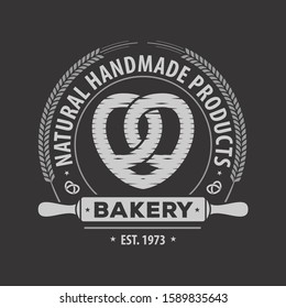 Bakery shop logo, emblem in vintage style with Pretzel. Vector illustration