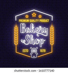Bakery shop neon bright signboard, light banner. Vector. Concept for badge, shirt, label, print, stamp or tee. Neon typography design with windmill, text, wheat ears. Template for restaurant identity