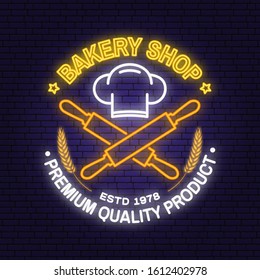 Bakery shop neon bright signboard, light banner. Vector. Concept for badge, shirt, label, print. Neon typography design with chef hat, text, rolling pin silhouette. Template for restaurant identity