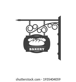 Bakery shop vintage signboard with metal chain and forged ornaments isolated hanging bread store sign. Vector antique bakery signage, fresh buns and loaf, baked food retro black street signboard