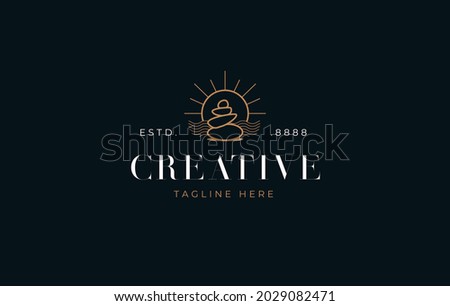 Balancing Rock Logo Design Template. Balanced stone design in the sun. Creative Vector Icon Design Concept.