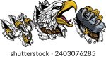 A bald eagle or hawk with claw talons holding an ice hockey puck and ripping or tearing through the background. Sports Mascot