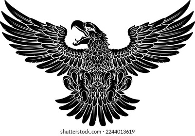 A bald eagle or hawk flying with wings spread mascot