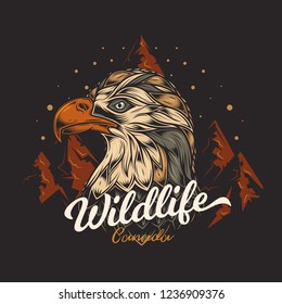 Bald eagle on the background of mountains. The original vector illustration is suitable for t-shirt design.