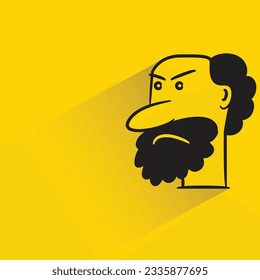 bald man with shadow on yellow background