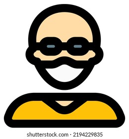 Bald man with specs having on mask for protection.
