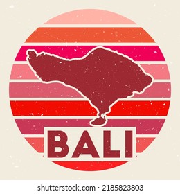 Bali logo. Sign with the map of the island and colored stripes, vector illustration. Can be used as insignia, logotype, label, sticker or badge of Bali.