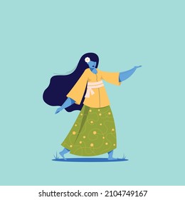 Mujer balinesa de pie mientras presenta algo

